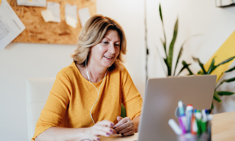 Employer Contact working at a desk in an office